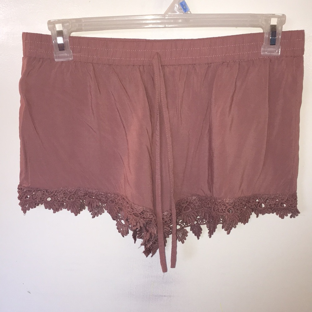 Deep pink shorts with flower pattern